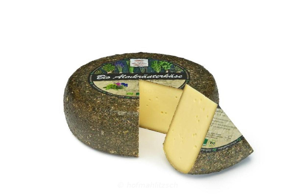 Produktfoto zu Almkräuterkäse - würzig, aromatisch mit pikanten Kräutergeschmack