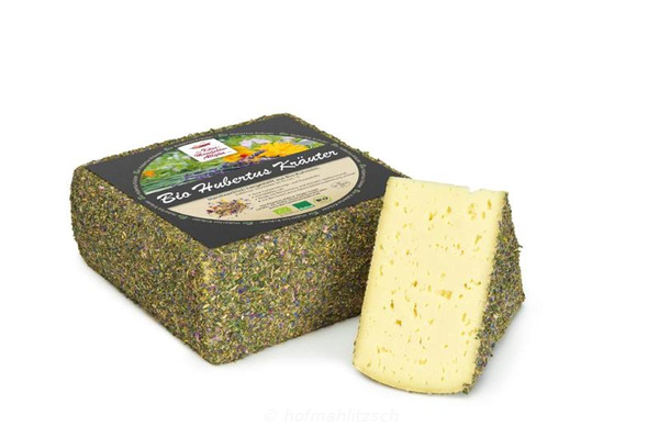 Produktfoto zu Hubertus Kräuter - Halbfester Schnittkäse, umhüllt mit Blüten & Kräutern